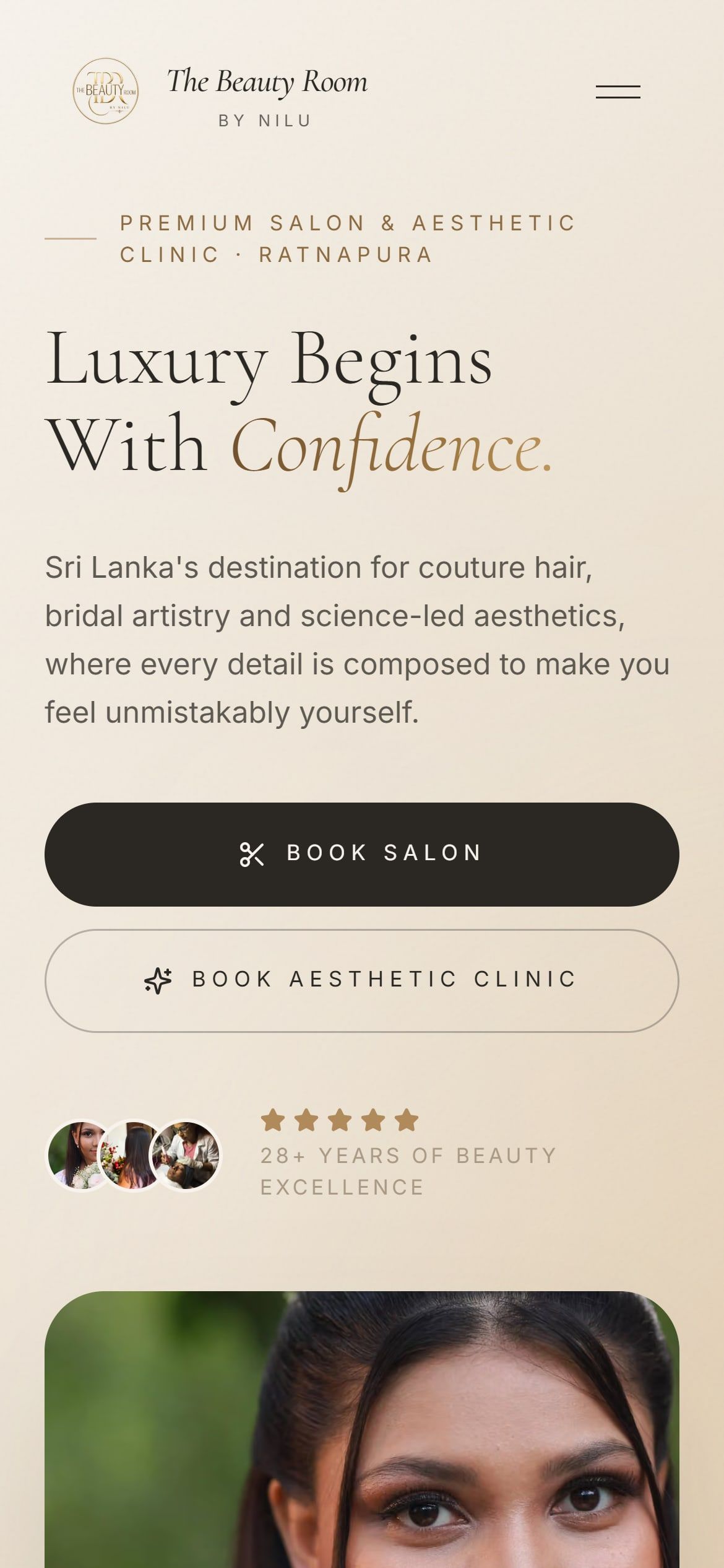 The Beauty Room's booking site on a phone, with buttons to book the salon or the aesthetic clinic.